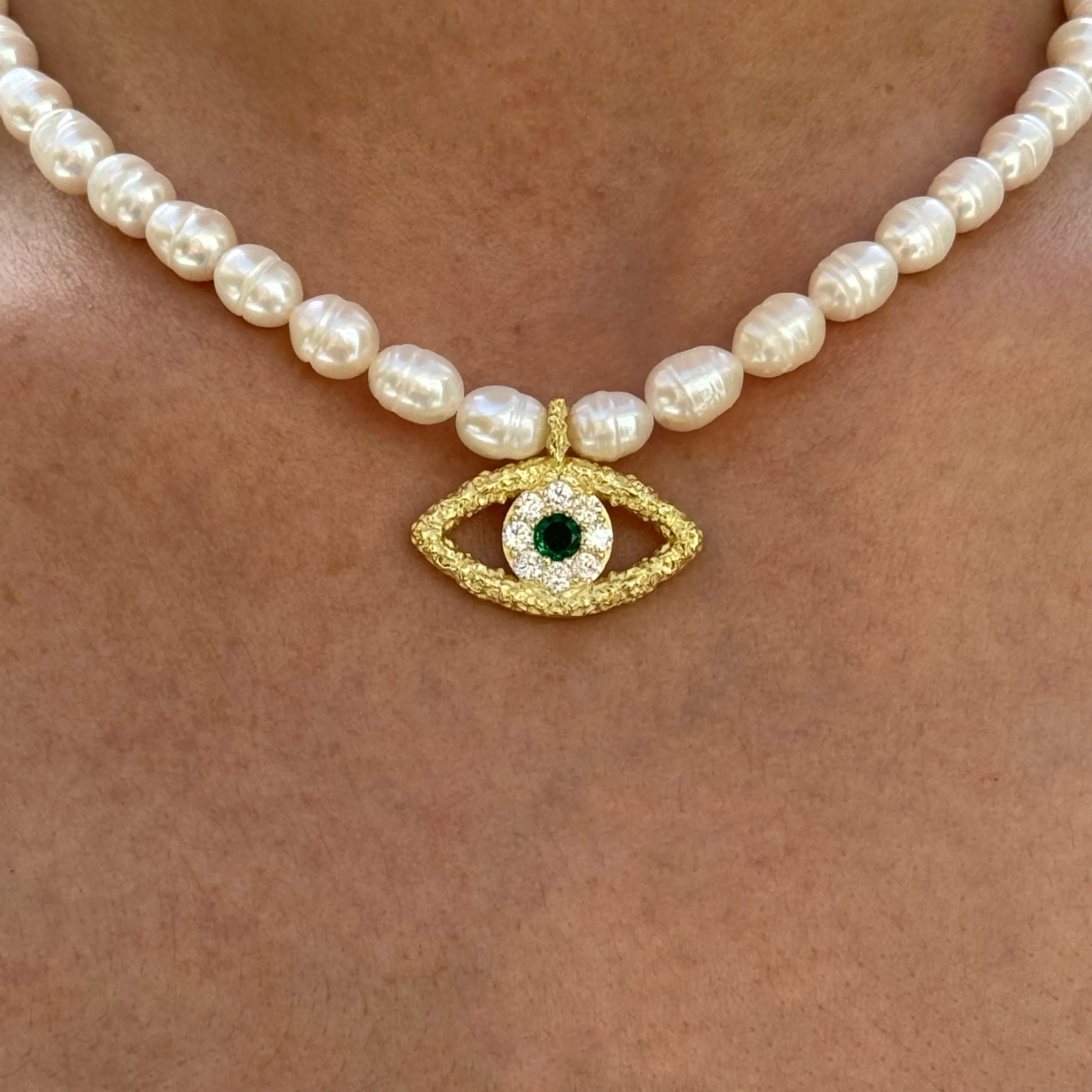 Pearl beaded hammered eye necklace